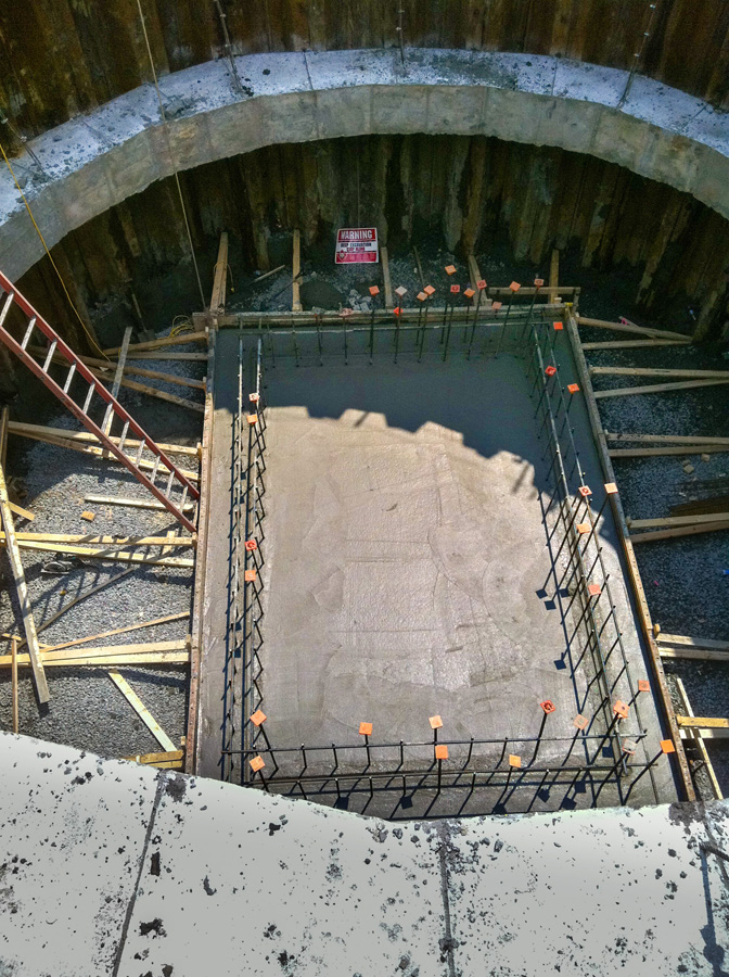 Construction of a pump station at a new wastewater treatment facility. A wet well is a storage chamber where wastewater collects before being pumped.